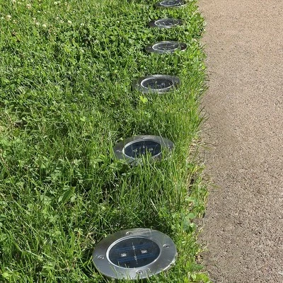 Sunnydaze Decor Sunnydaze Outdoor Solar Garden Disk Style Bright White Pathway Ground Stake Lights for Driveway or Yard - 6pk 4 Sunnydaze Decor Sunnydaze Outdoor Solar Garden Disk Style Bright White Pathway Ground Stake Lights for Driveway or Yard - 6pk - Image 2