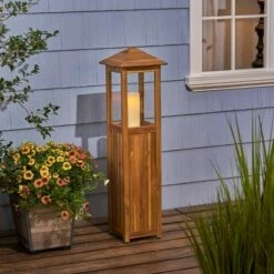 47" Claudine Standing Acacia Wood Candle Outdoor Lantern Teak - Christopher Knight Home