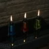 Sunnydaze Decor Sunnydaze Outdoor Refillable Glass Tabletop Torches with Long-Lasting Fiberglass Wicks - Blue, Orange, and Green - 3pc
